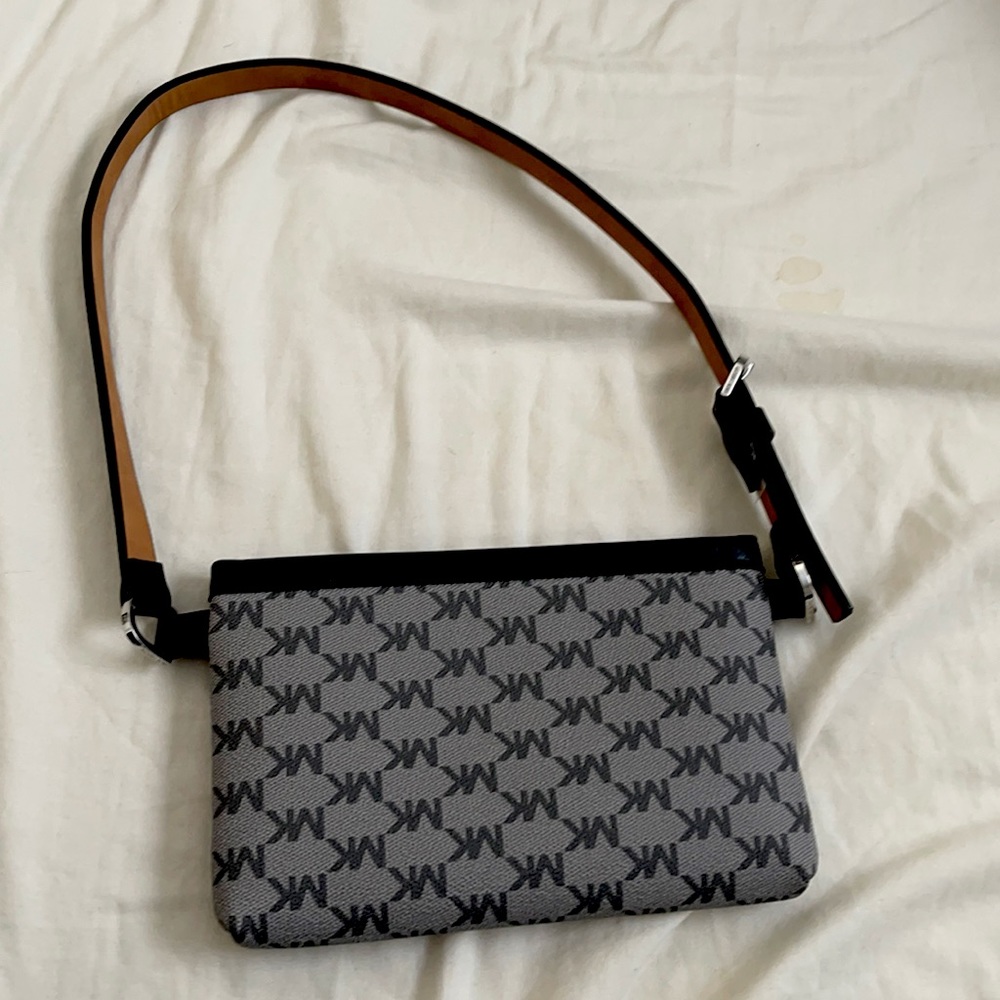 Micheal Kors clutch with shoulder strap